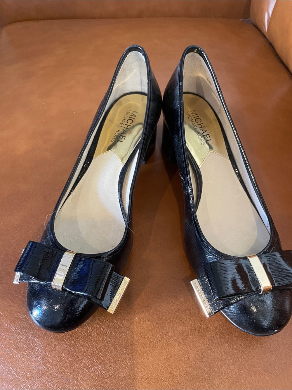 Michael Kors Black Patent Bow Flats with Gold Trim